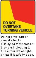 DO NOT OVERTAKE TURNING VEHICLE sign